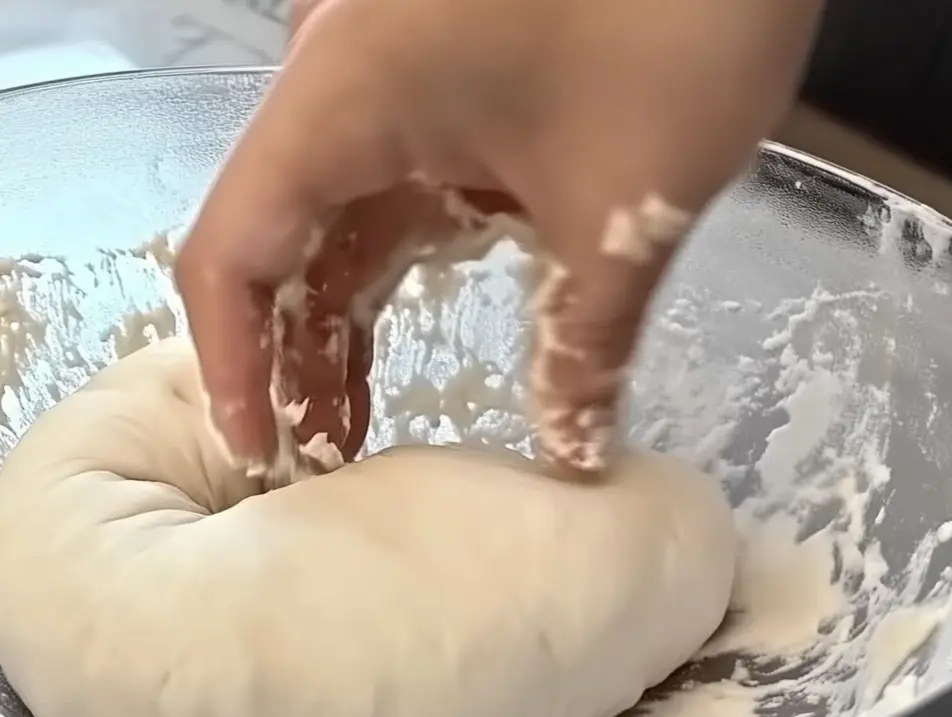 Kneading Dough for Homemade Bread Preparation