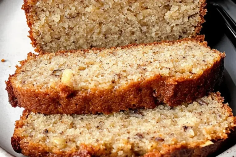 A beautiful slice of Cottage Cheese Banana bread on a white plate.