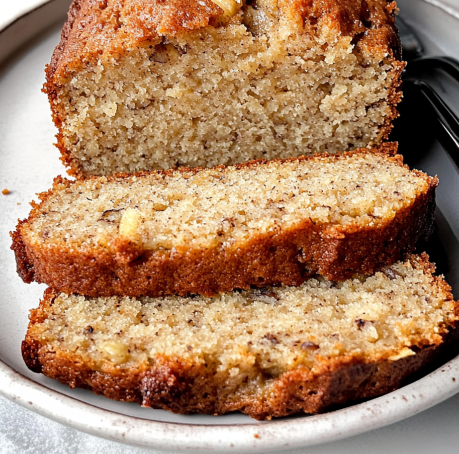 A beautiful slice of Cottage Cheese Banana bread on a white plate.